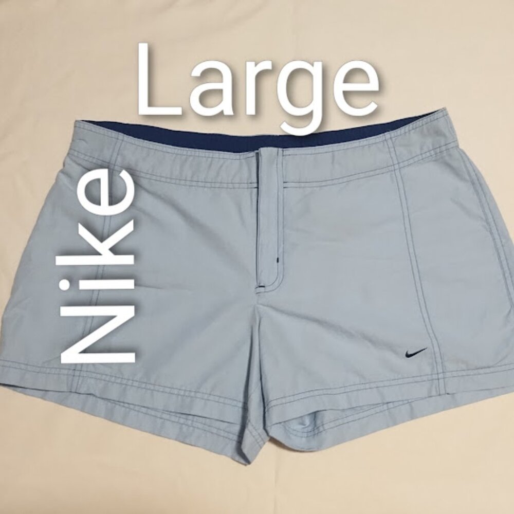 Share NIKE Womens Shorts Size Large Athletic Activewear EUC light Blue Zip Pocke